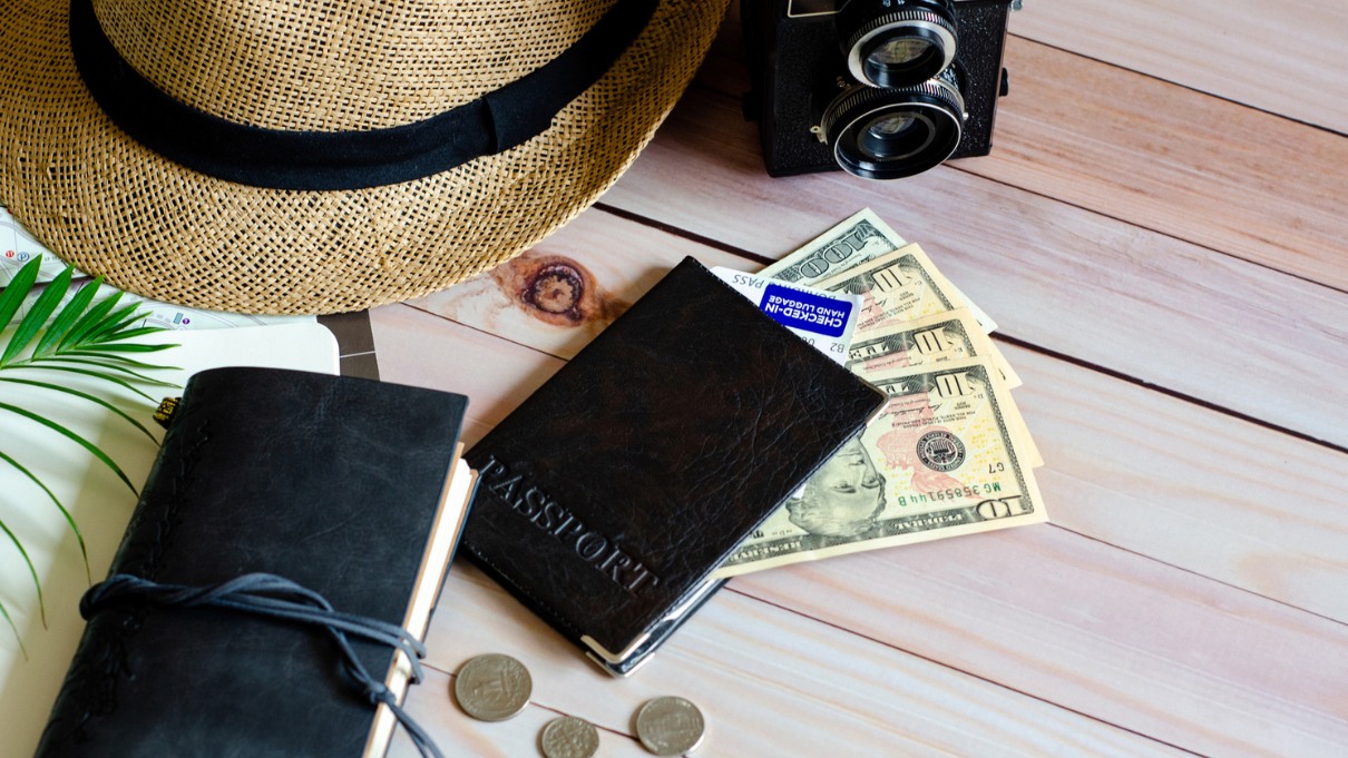 Passport, money and camera ready for travel
